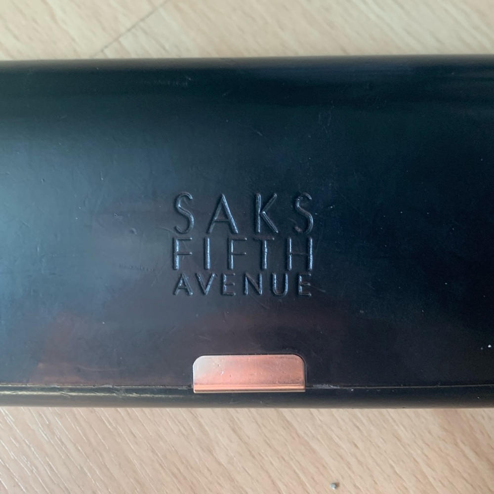 Saks fifth Ave glasses case. Black with velvet interior.